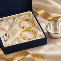 Gold baby bangles in a gift box
