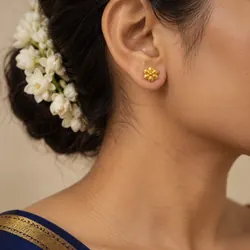 22K gold flower studs worn
